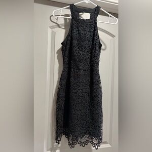 Women’s black lace dress. Above the knee.